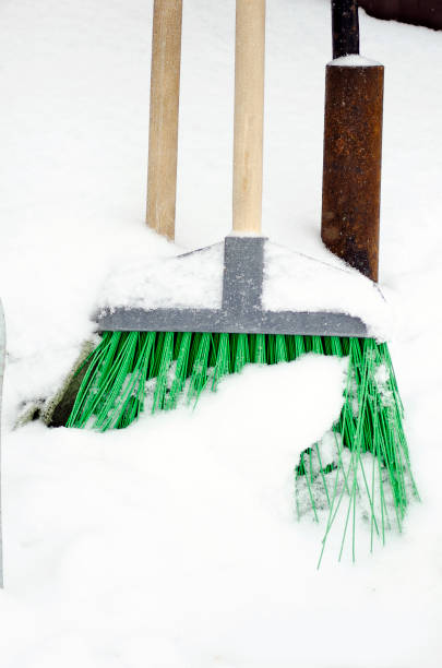 istock Snow broom, close-up. City life. 1301616825