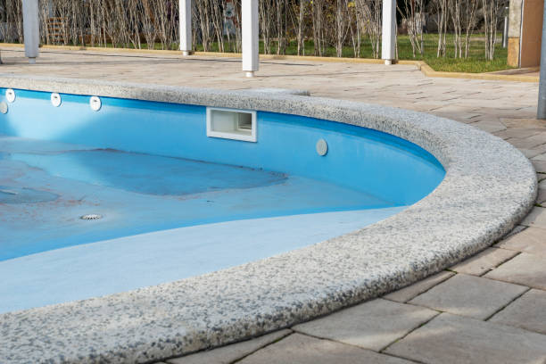 istock close up image of empty swimming pool without water in hotel, renovation process, 1301617223