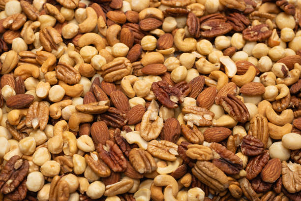 istock Mix of nuts as a background. 1301618462