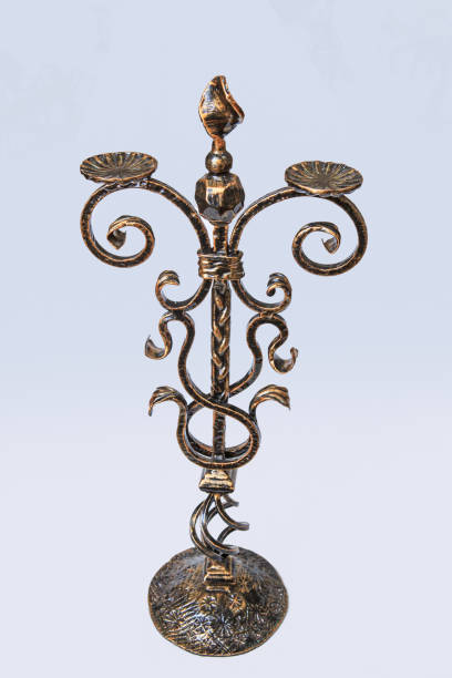 istock Exclusive hand forged candlestick on a white background 1301620938