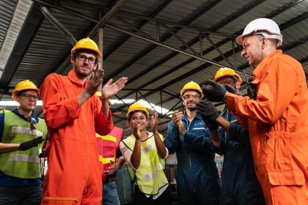 istock Skillful worker celebrate success in the factory . 1301622206