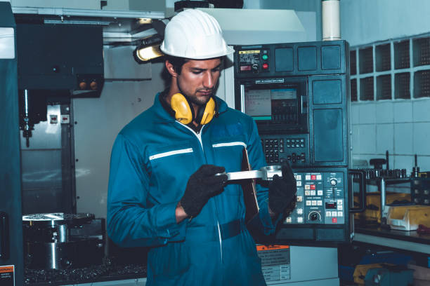 istock Smart factory worker or engineer do machine job in manufacturing workshop 1301623729