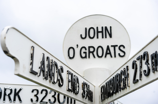 The famous sign at the village of John o'Groats in the far north of Scotland's mainland, with distances to Lands End in England and Edinburgh.