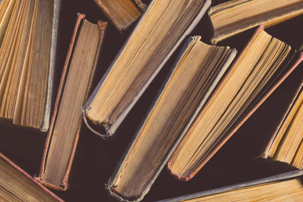 istock Old hardback books or textbooks. Top view. Education concept. 1301635685