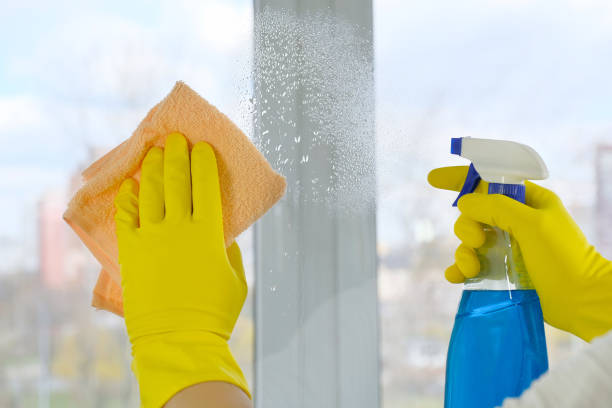 istock Window cleaning with a rag and detergent. Close-up. Cleaning concept. 1301635777