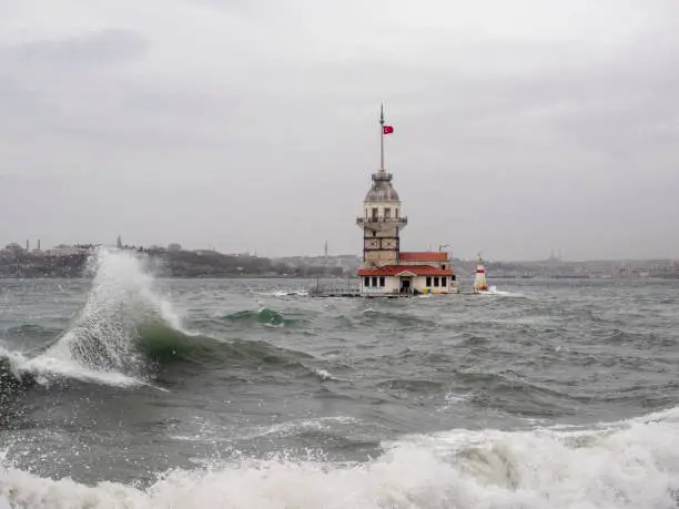 Maidens Tower and southwest wind storm with waves in Istanbul,Turkey