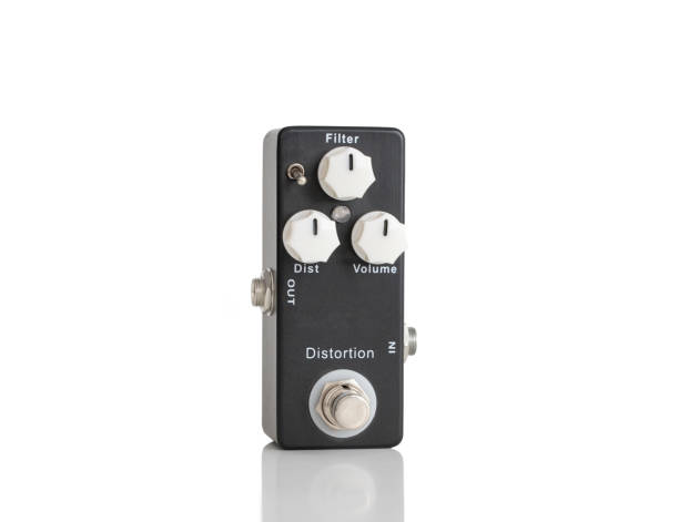 istock Black Distortion Guitar Pedal Isolated On White Background 1301637112