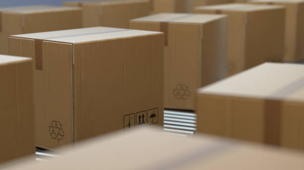 istock Cardboard boxes on conveyor belt line isolated on white grey background. Distribution warehouse. E-commerce, production, storage, delivery and packaging service concept. 3d render 1301637679