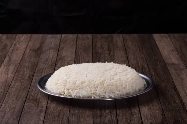 Photo of Portion of cooked white rice. Popular food from restaurants. Gourmet photography.