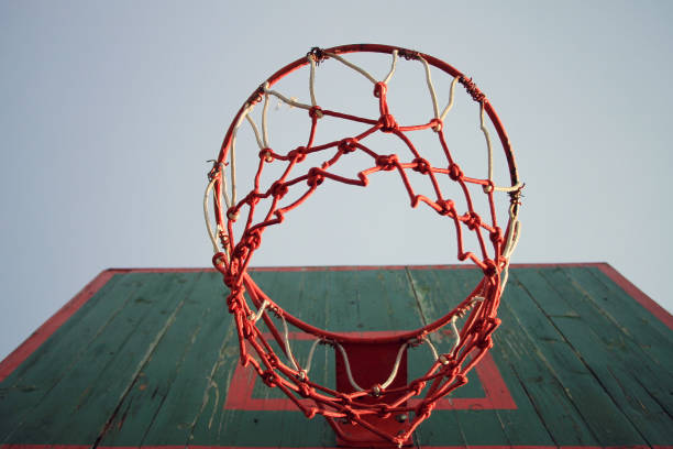 istock Basketball hoop and blue sky 1301646699