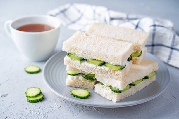 istock Cucumber cream cheese sandwiches on the plate 1301648213