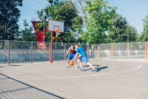 istock Sportsmen Playing Basketball 1301649150