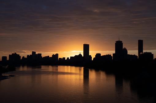 Charles river in Boston during sunrise with no boats on the water