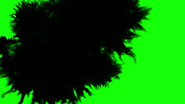Black ink drops green screen
