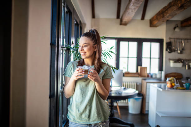 istock Young woman relaxing at home 1301653139
