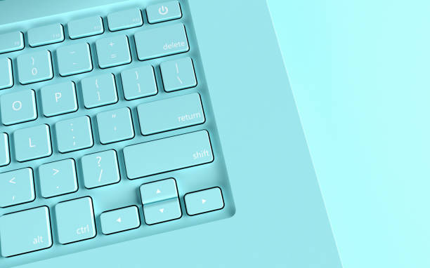 istock Laptop Keyboard on Blue Background 1301658534