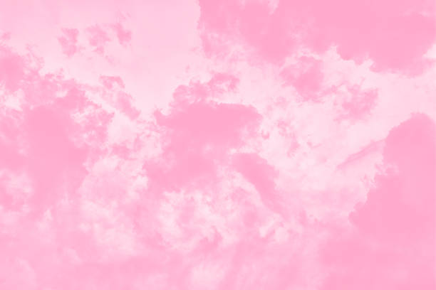 istock Pastel pink soft sky background with blurred clouds 1301661197