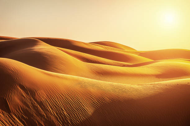 песчаные дюны на закате - desert стоковые фото и изображения