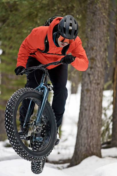istock Winter Fat Bike Jump 1301667146
