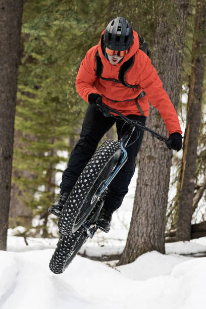 istock Winter Fat Bike Jump 1301667151