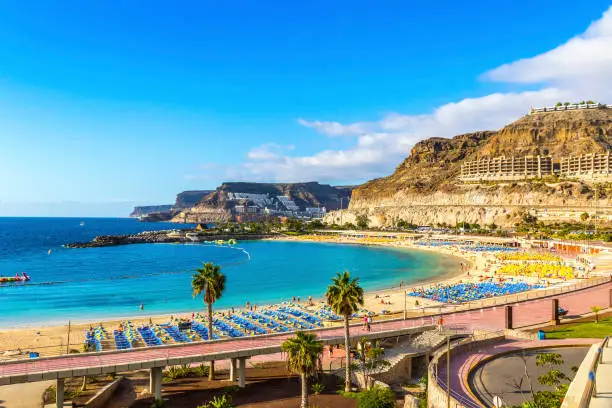 Panorama of Amadores beach (Spanish: Playa del Amadores) near famous holiday resort Puerto Rico de Gran Canaria on Gran Canaria island, Spain