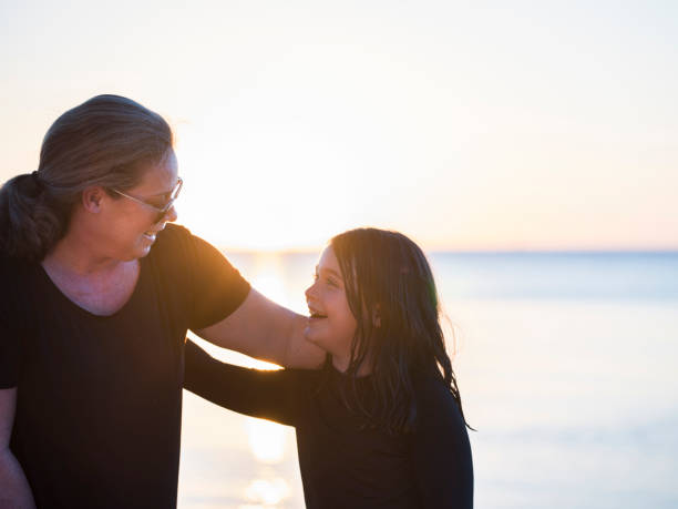 istock Australian Family on Summer Beach Water Play 1301670921