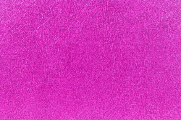 istock Pink leather abstract background. Close up magenta leather texture. Pink background 1301671964
