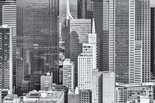 Close up, black and white image of the buildings of downtown Dallas, Texas shot aerially from an altitude of about 600 feet without any distinguishable landmarks making this a great generic background urban photo.