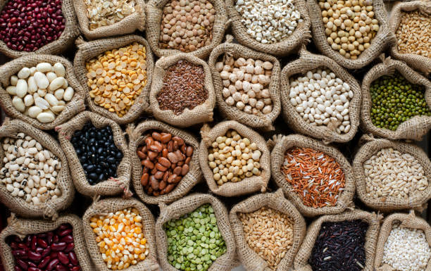 Variety kinds of natural cereal and grain seed in sack and dark tone, for clean food raw material and agricultural product concept Variety kinds of natural cereal and grain seed in sack and dark tone, for clean food raw material and agricultural product concept organic red cowpea beans stock pictures, royalty-free photos & images