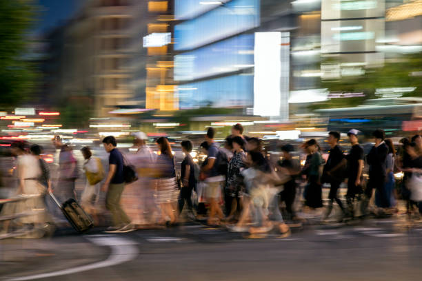 istock Group of people at crosswalk 1301677081