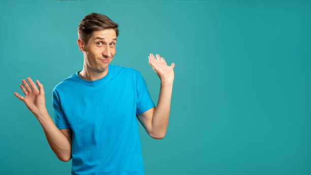 istock confused male portrait refusal gesture so what 1301677203