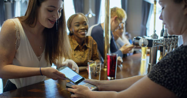 istock Confirmation Screen Showing Mobile Payment at Bar 1301680753