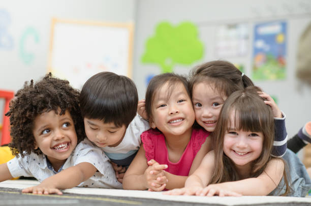 istock Super cute multi ethnic group of preschool children 1301683488