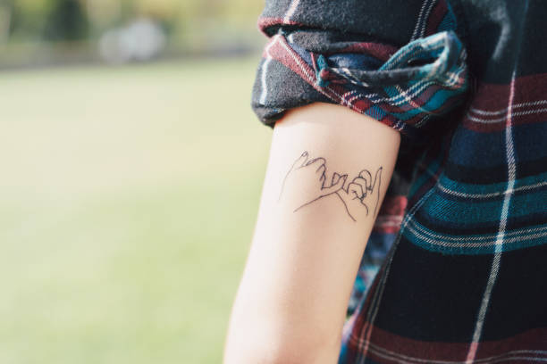 istock Woman with tattoo 1301694247