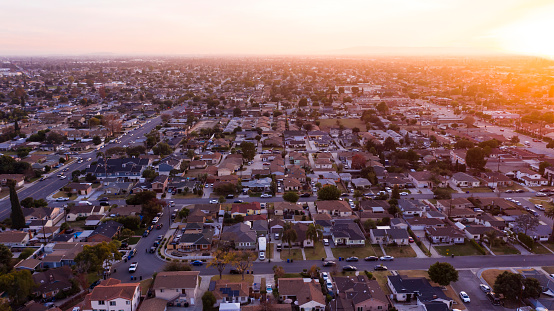 Sunset aerial view of a neighborhood in Downey, California, USA.