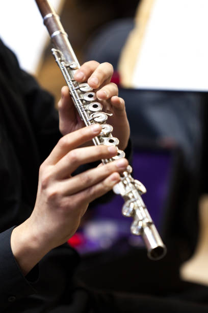 istock Hands of a musician playing the flute 1301701473