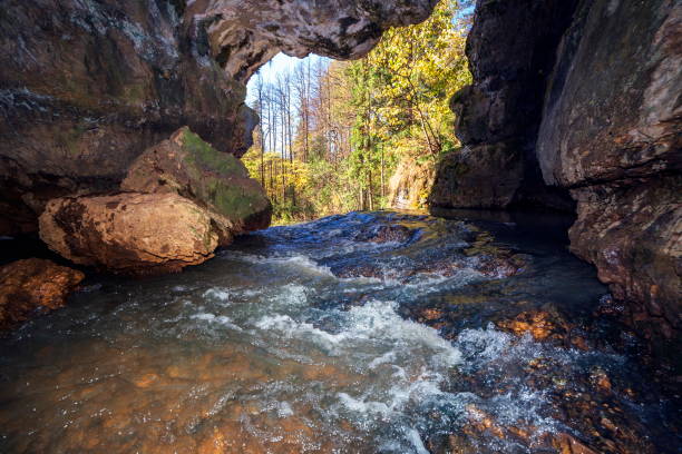 istock A large beautiful grotto from which the atysh waterfall flows 1301709700