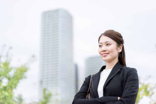 istock Woman with arms folded (business image) 1301713577