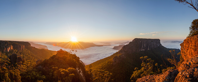 Panorama of sunrise over mountains and valleys, south coast, NSW, Australia