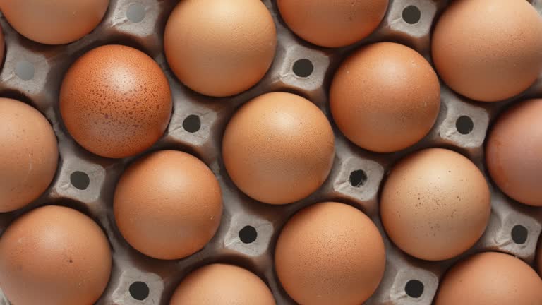 Rotation of Brown eggs in carton box
