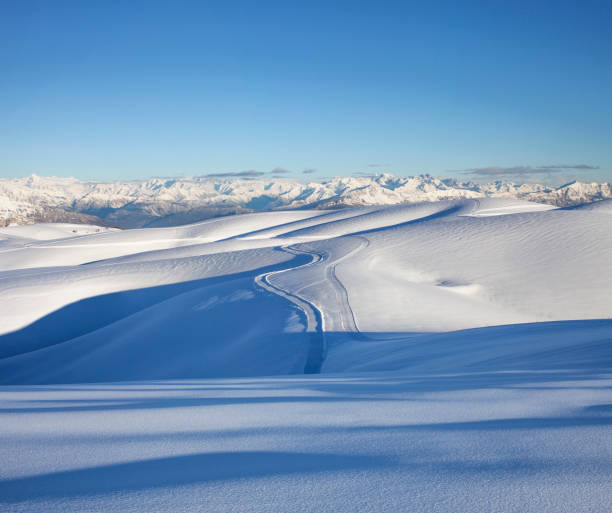 istock Snowy mountains with cross-country trails 1301716202
