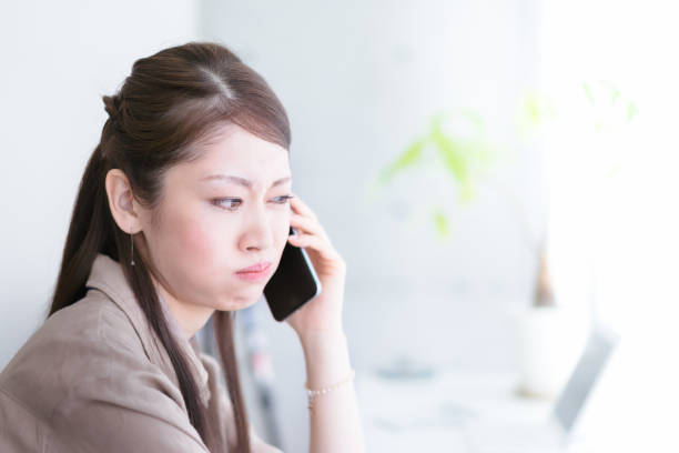 istock Young woman talking by the window 1301717371