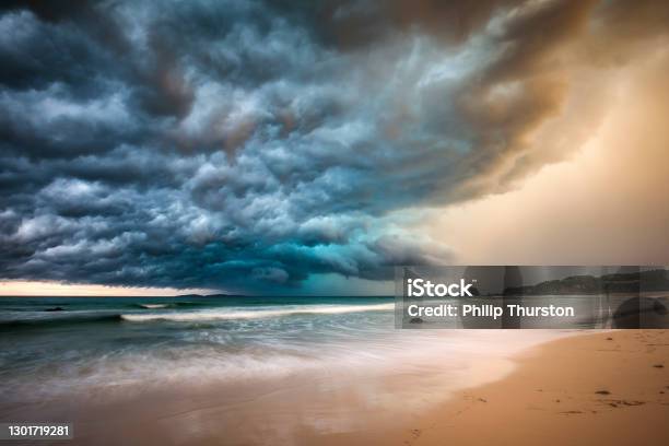 Powerful Dramatic Storm Cell Over Ocean Beach Stock Photo - Download Image Now - Climate Change, Storm, Sea
