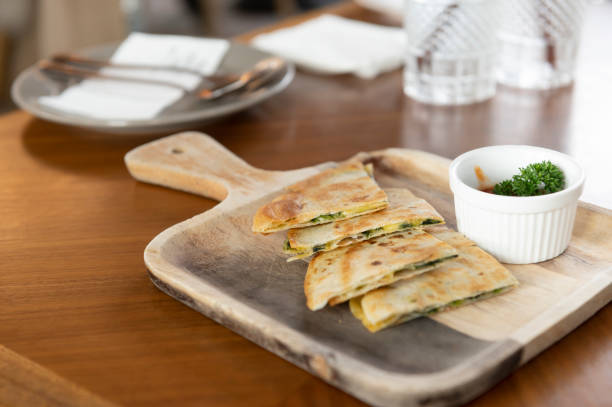 istock Crispy pizza on wooden plates with sauce cups 1301720863