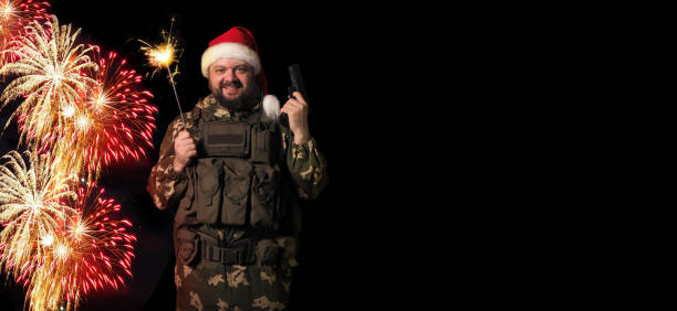 istock Soldier celebrating Christmas on black background 1301723391