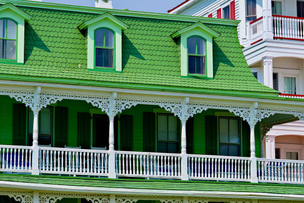 Cape May, New Jersey / USA - September 4, 2012: Close-up of a painted green Victorian-era house across from the beach.