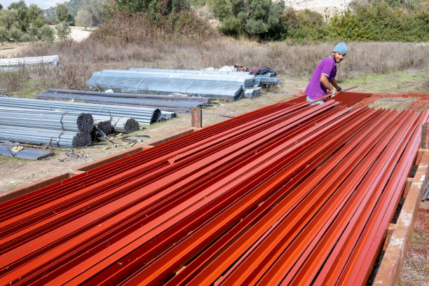 istock Young manual worker working hard in production lane 1301727133