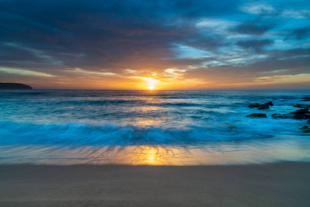 istock High cloud beautiful sunrise seascape 1301727707