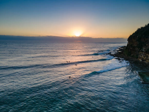 istock Aerial sunrise seascape with low cloud bank 1301728320