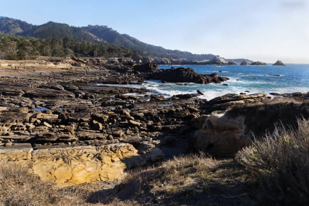 istock Landscape with  Pacific ocean and rocky shore. 1301729596